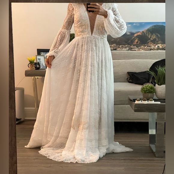 Natalia Antolin Dresses & Skirts - Wedding dress NEVER worn size small from Argentinian designer Natalia Antolin